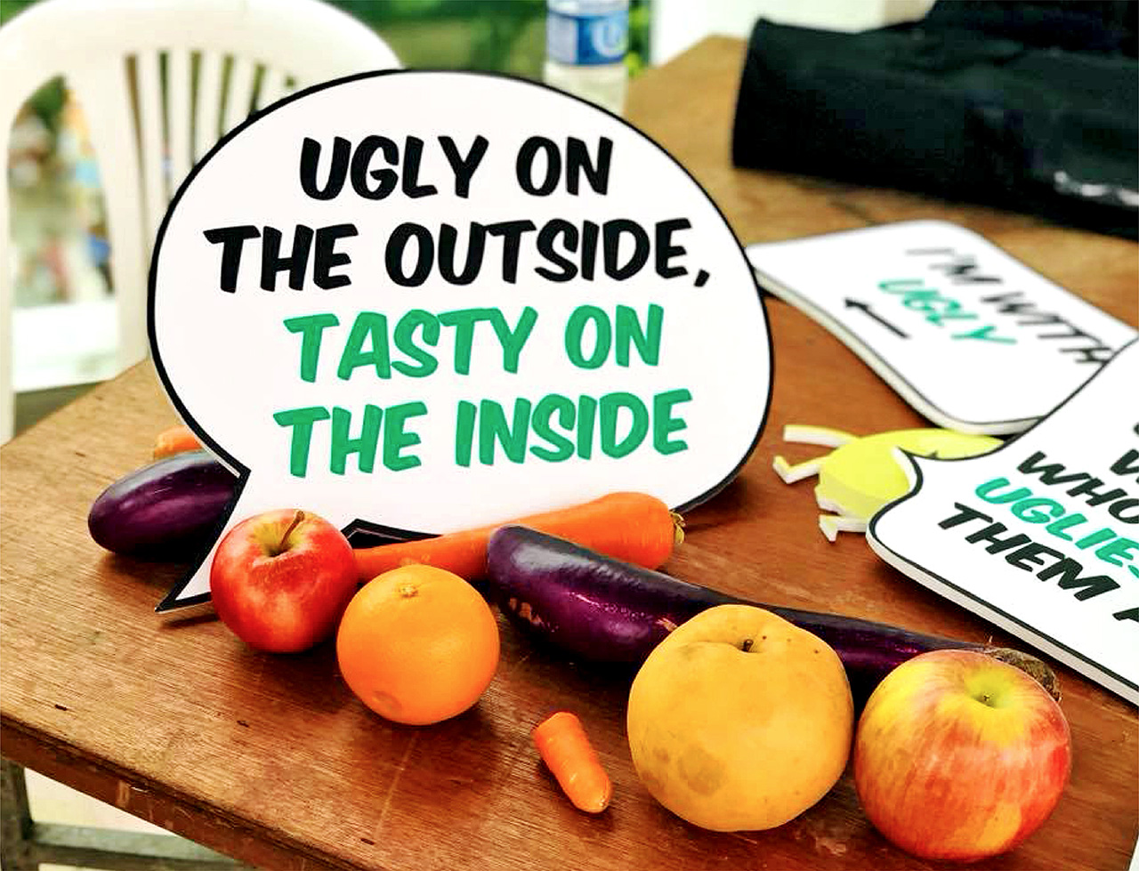 Raising awareness on food wastage at the UglyFood booth during Feeding the 5000 Singapore event